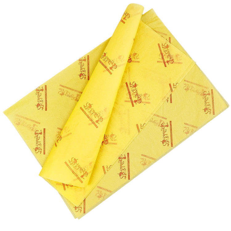 Yellow wrapping paper with red pattern printing