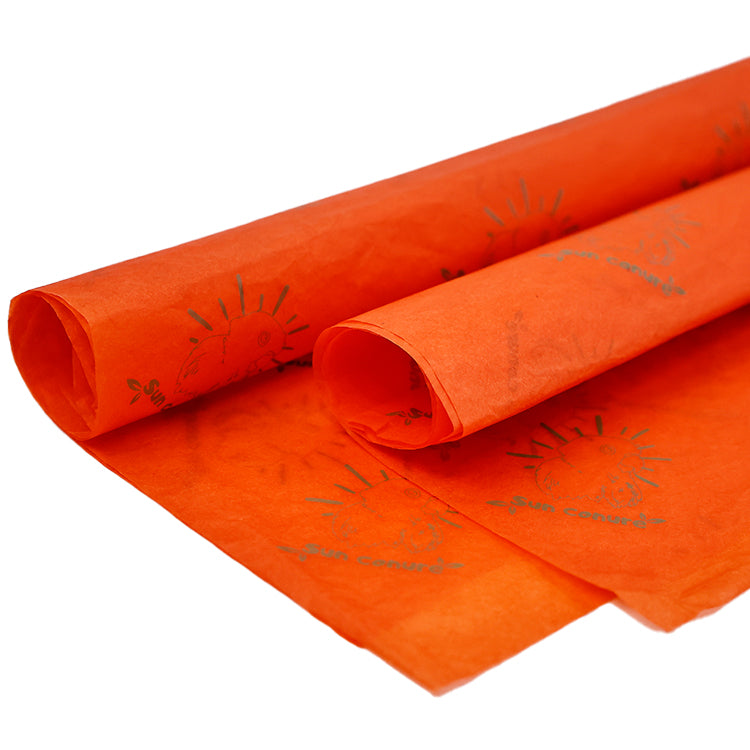 Orange wrapping paper pattern printed with gold