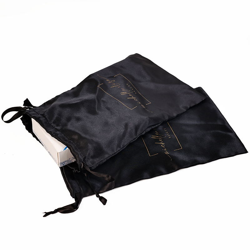 Black pattern gold-stamped drawstring bag 7.15