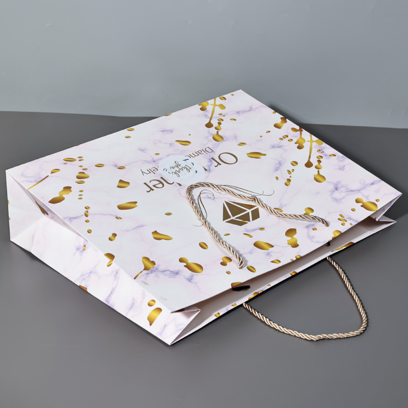 Marble pattern all over print gold stamped tote bag