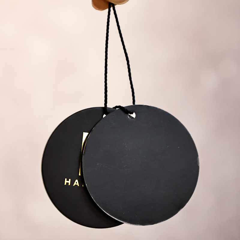 Black round pattern gold stamped hangtag 2.22