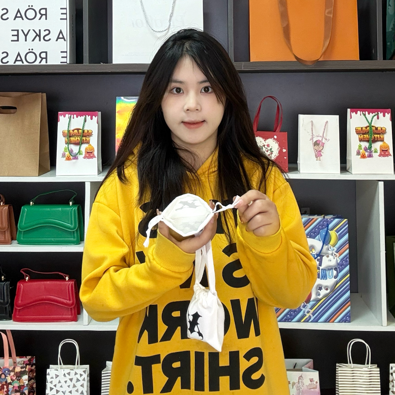 White small drawstring bag 3.11