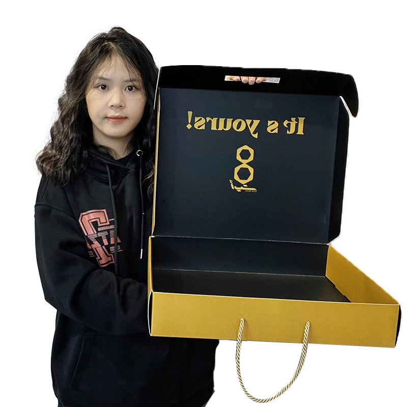 Flip-top airplane box with hand strap design