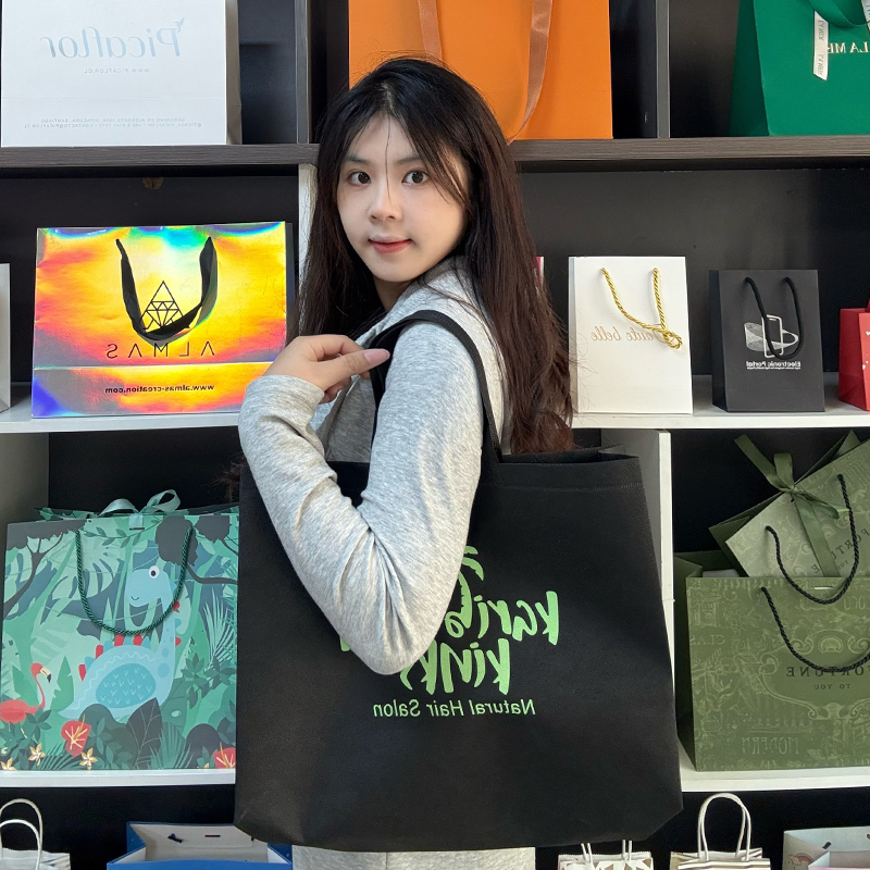 Black non-woven green printed tote bag 4.9
