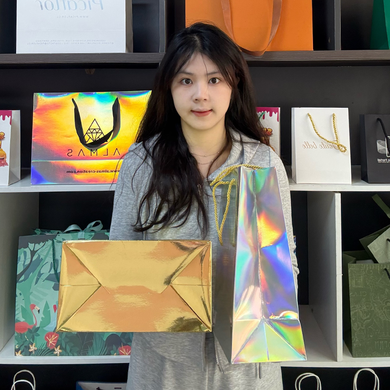 Full-page laser and hot stamping printing paper bag