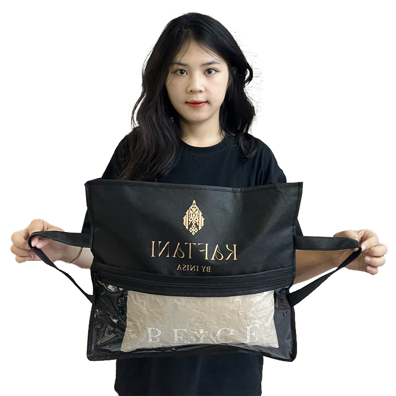 Black non-woven packaging bag with middle zipper and transparent skylight design at the bottom 5.11