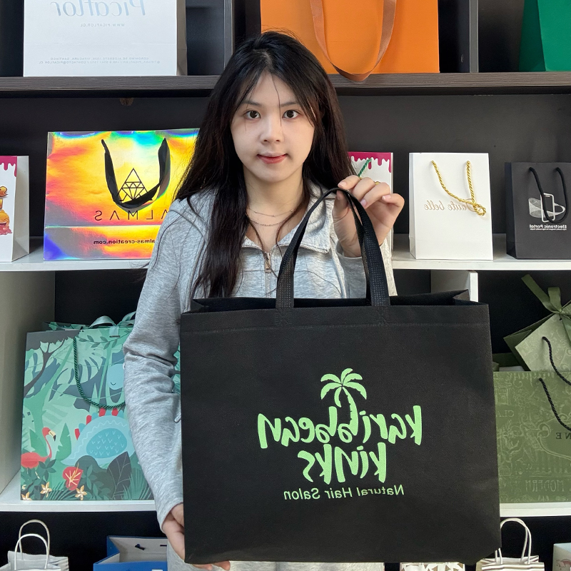 Black non-woven green printed tote bag 4.9