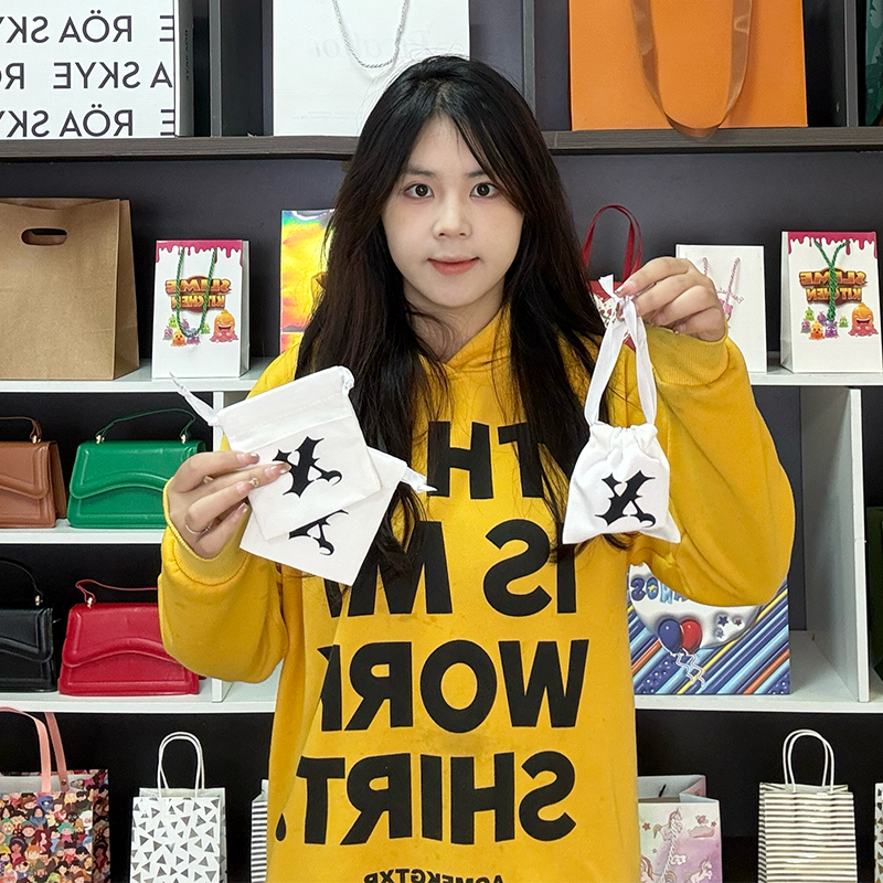 White small drawstring bag 3.11