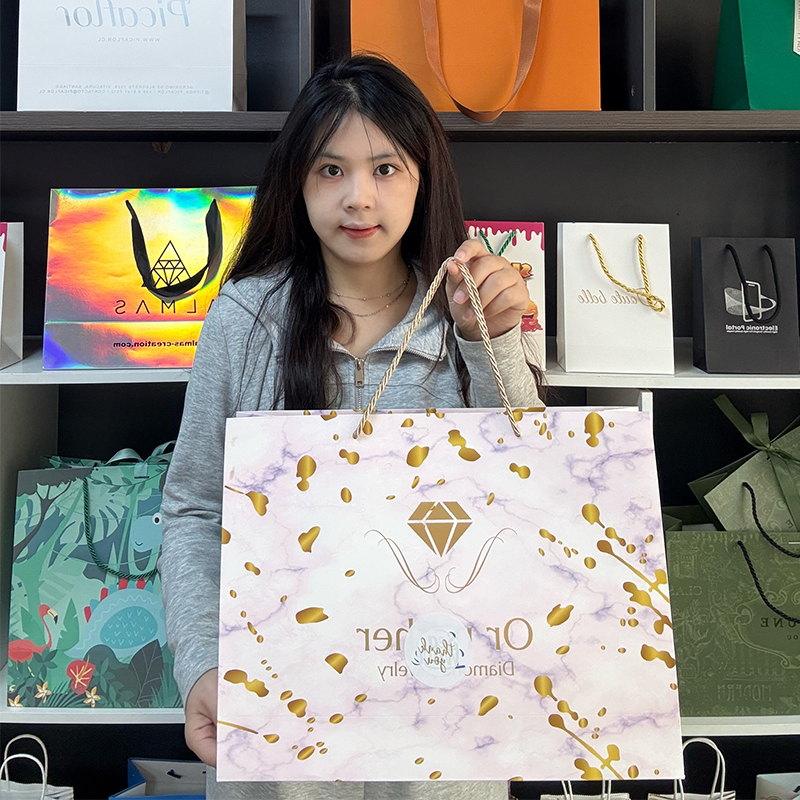 Marble pattern all over print gold stamped tote bag