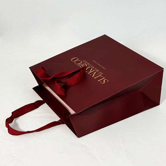 Red paper bag with gold stamping pattern