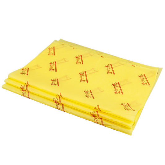 Yellow wrapping paper with red pattern printing