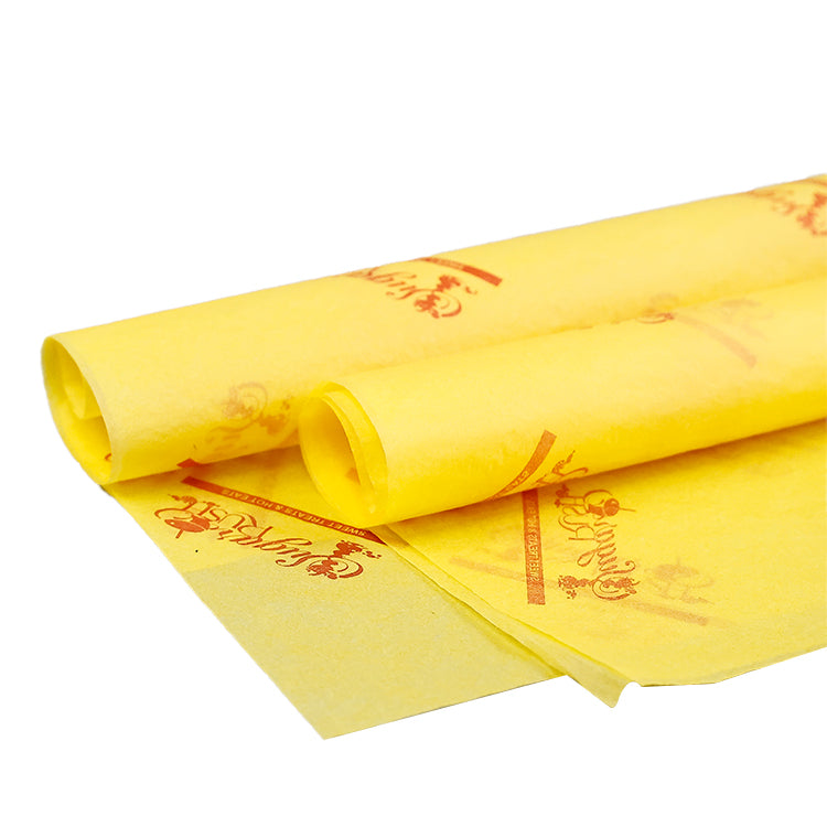 Yellow wrapping paper with red pattern printing