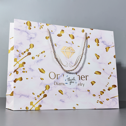 Marble pattern all over print gold stamped tote bag