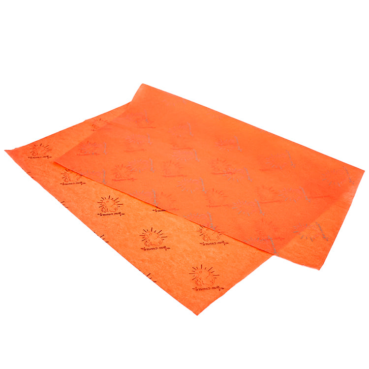 Orange wrapping paper pattern printed with gold
