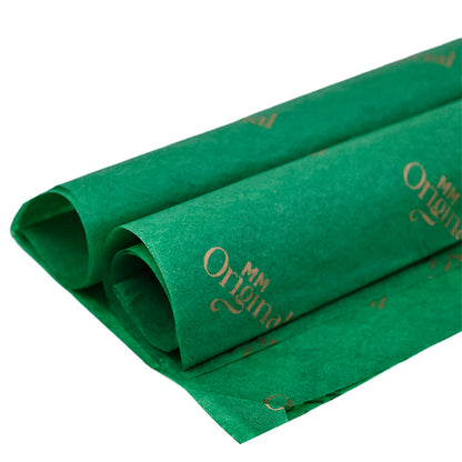 Green wrapping paper pattern with gold foil printing