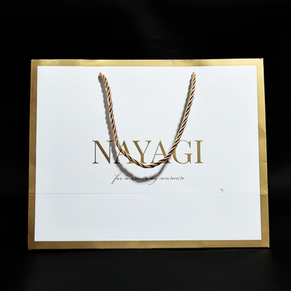 White pattern gold stamped paper bag with gold around the edges
