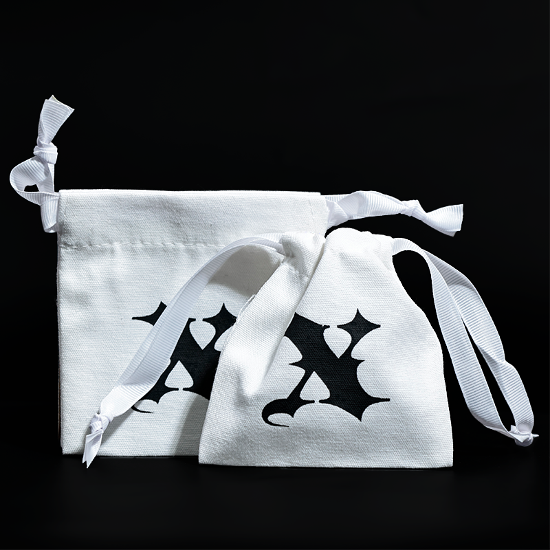 White small canvas drawstring bag 12.17