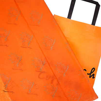 Orange wrapping paper pattern printed with gold