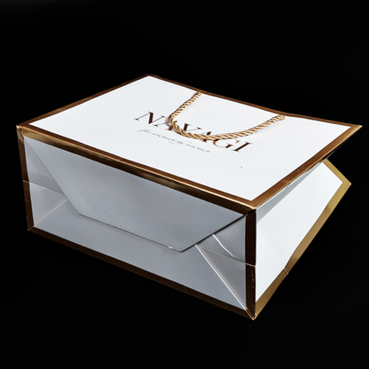 White pattern gold stamped paper bag with gold around the edges