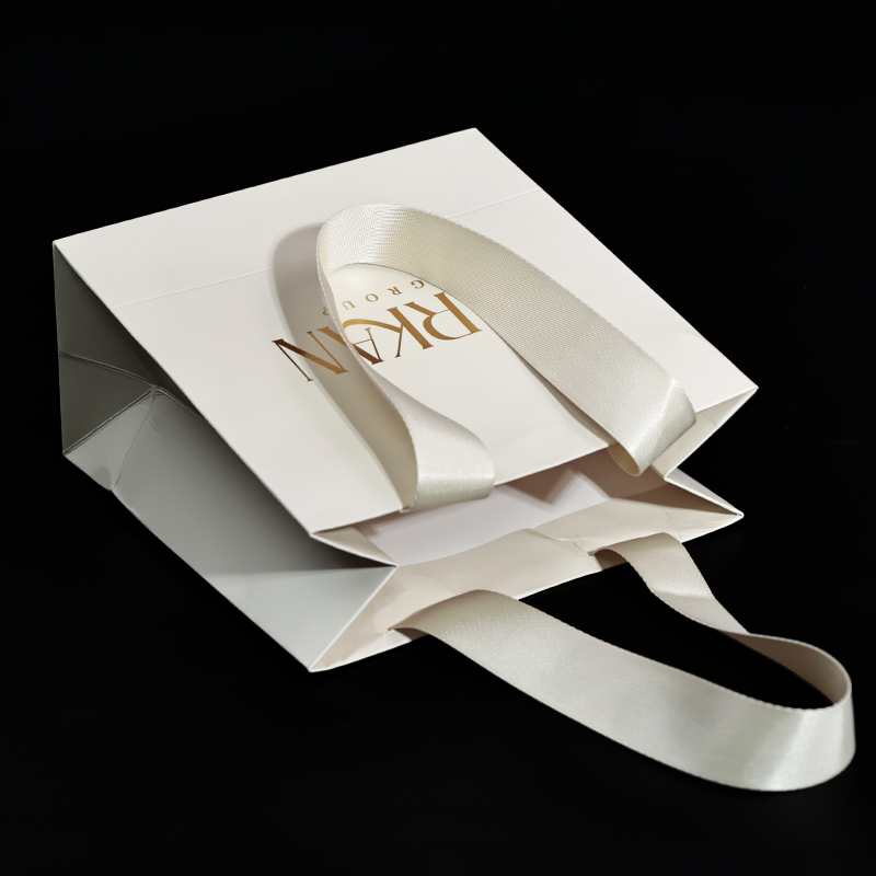 Off-white pattern gold-stamped string handbag