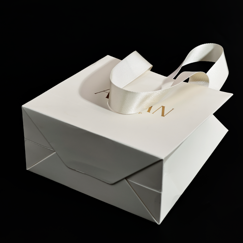 Off-white pattern gold-stamped string handbag