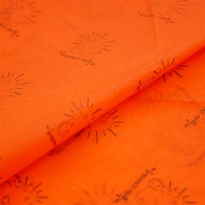 Orange wrapping paper pattern printed with gold