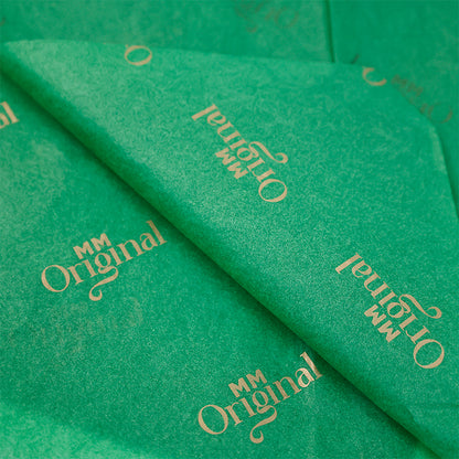 Green wrapping paper pattern with gold foil printing