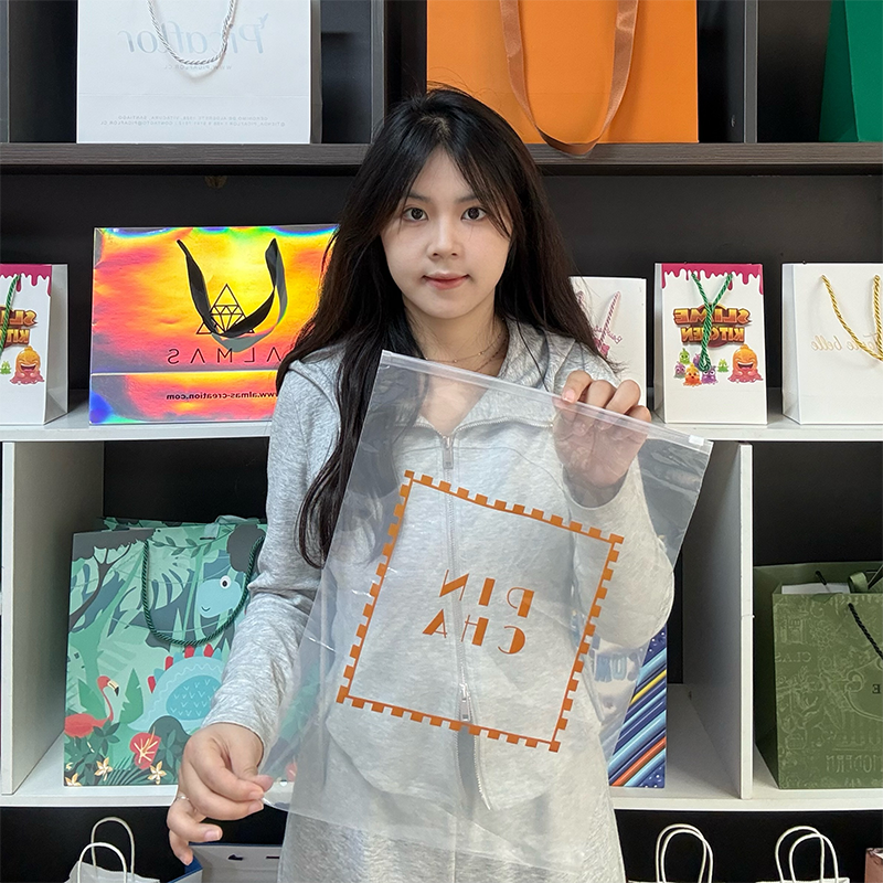 Orange printed transparent PE zipper bag