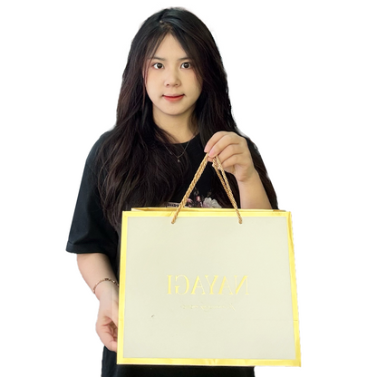 White pattern gold stamped paper bag with gold around the edges