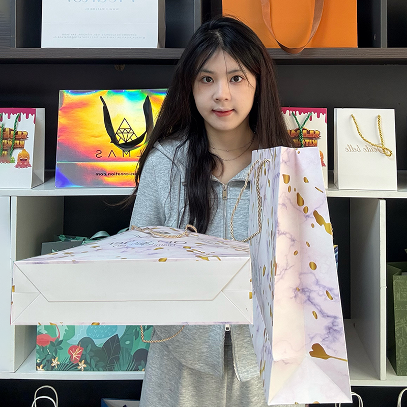 Marble pattern all over print gold stamped tote bag